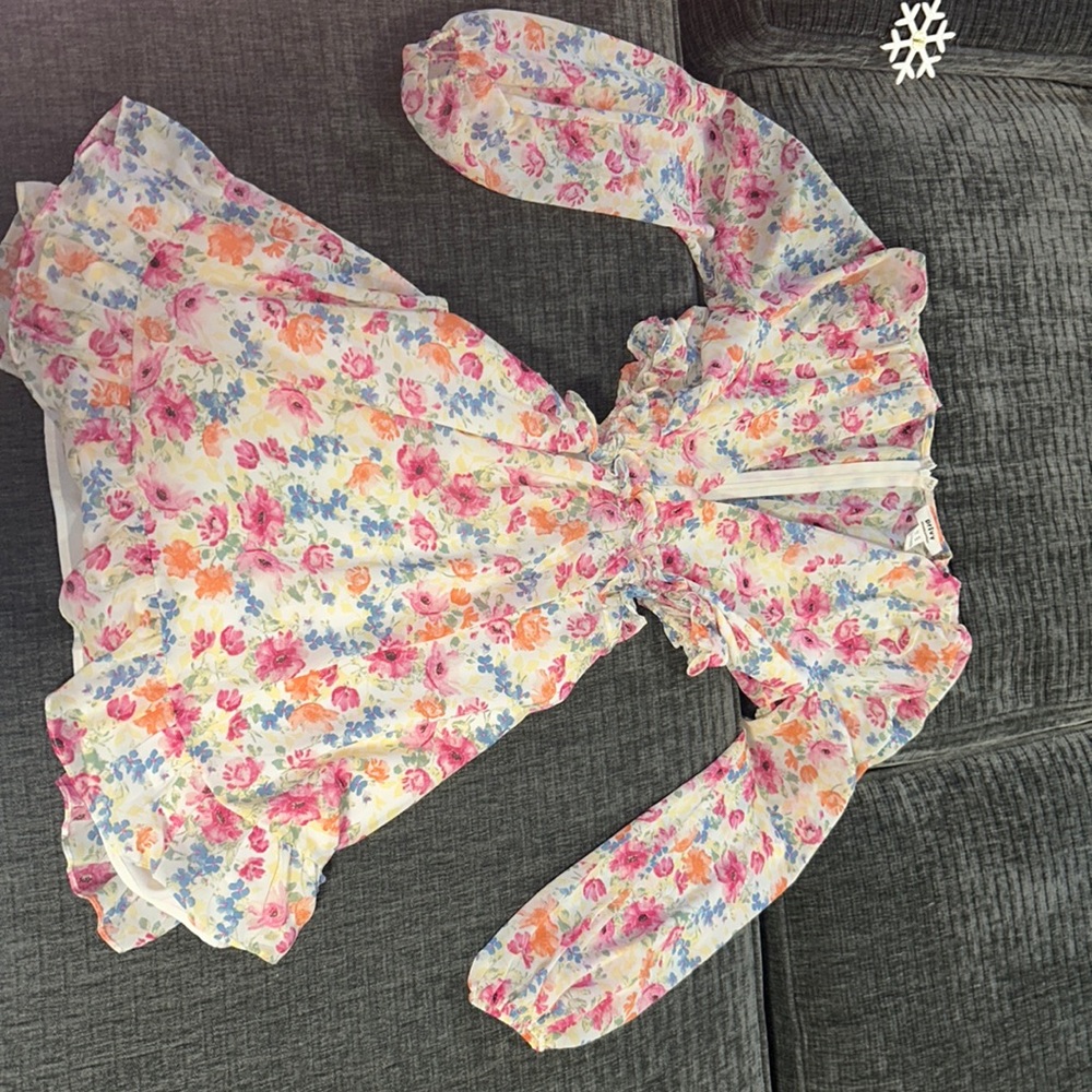 Super cute boutique dress. This girl has a lot going on.